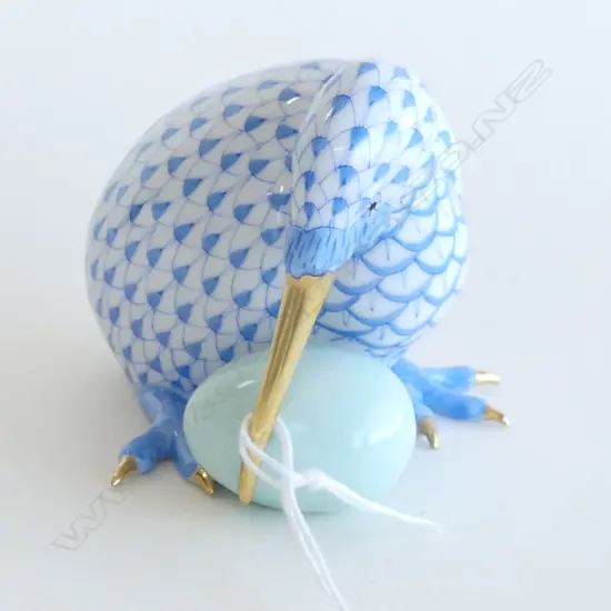 A Herend Porcelain kiwi,  in blue 'fishnet' pattern